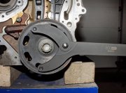 svänghjul mothållare