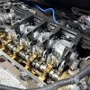 Spännverktyget i användning vid demontering av Multiair-ställdon i Alfa Romeo-motor